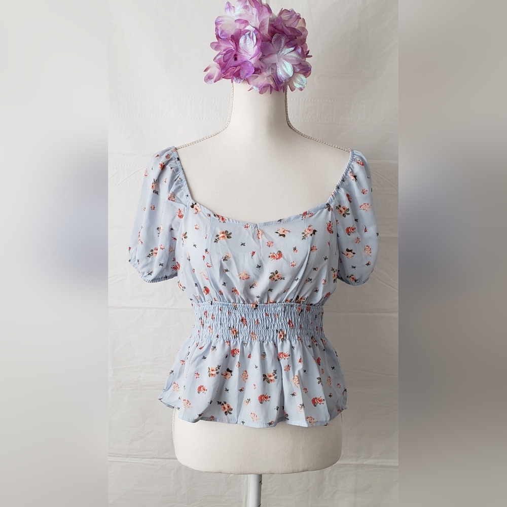 NO COMMENT Ruffle Tie Back Peplum Blouse